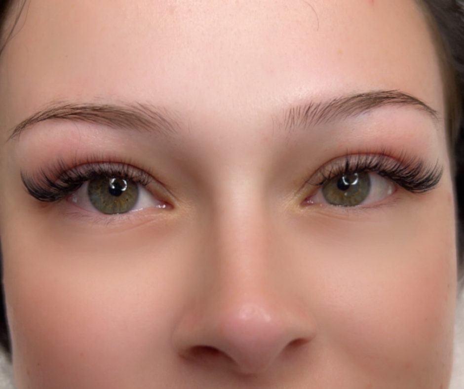 Mahogany client with a full volume lash set on both eyes